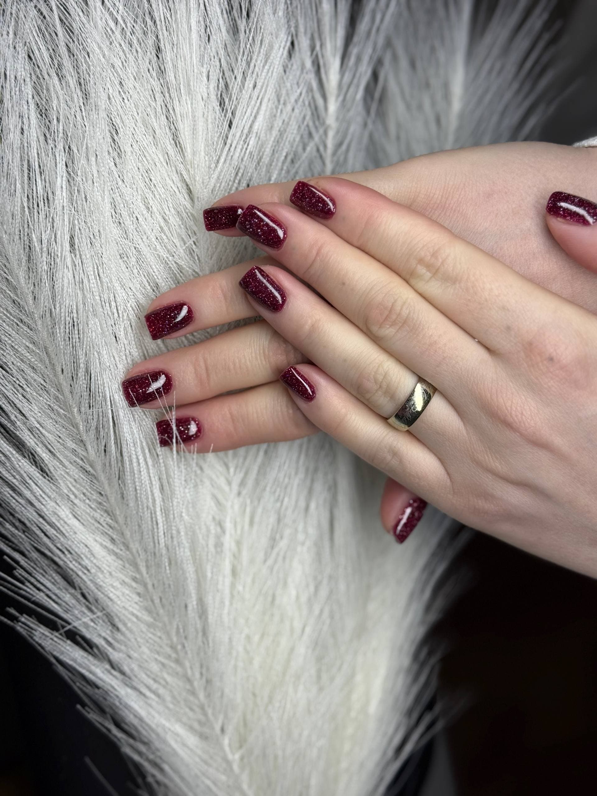 Deep burgundy glitter gel manicure on short square nails