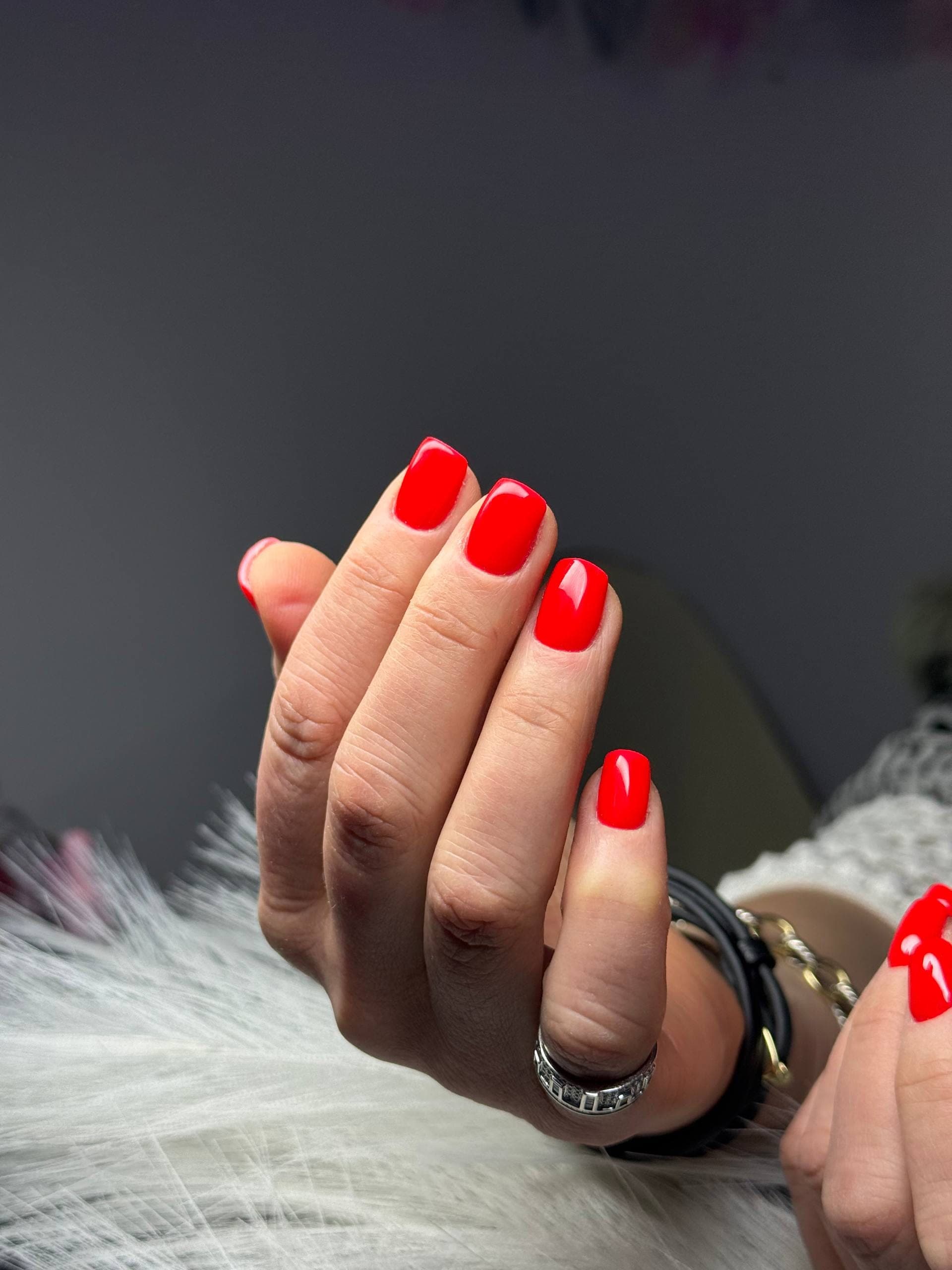 Bright red short square gel manicure